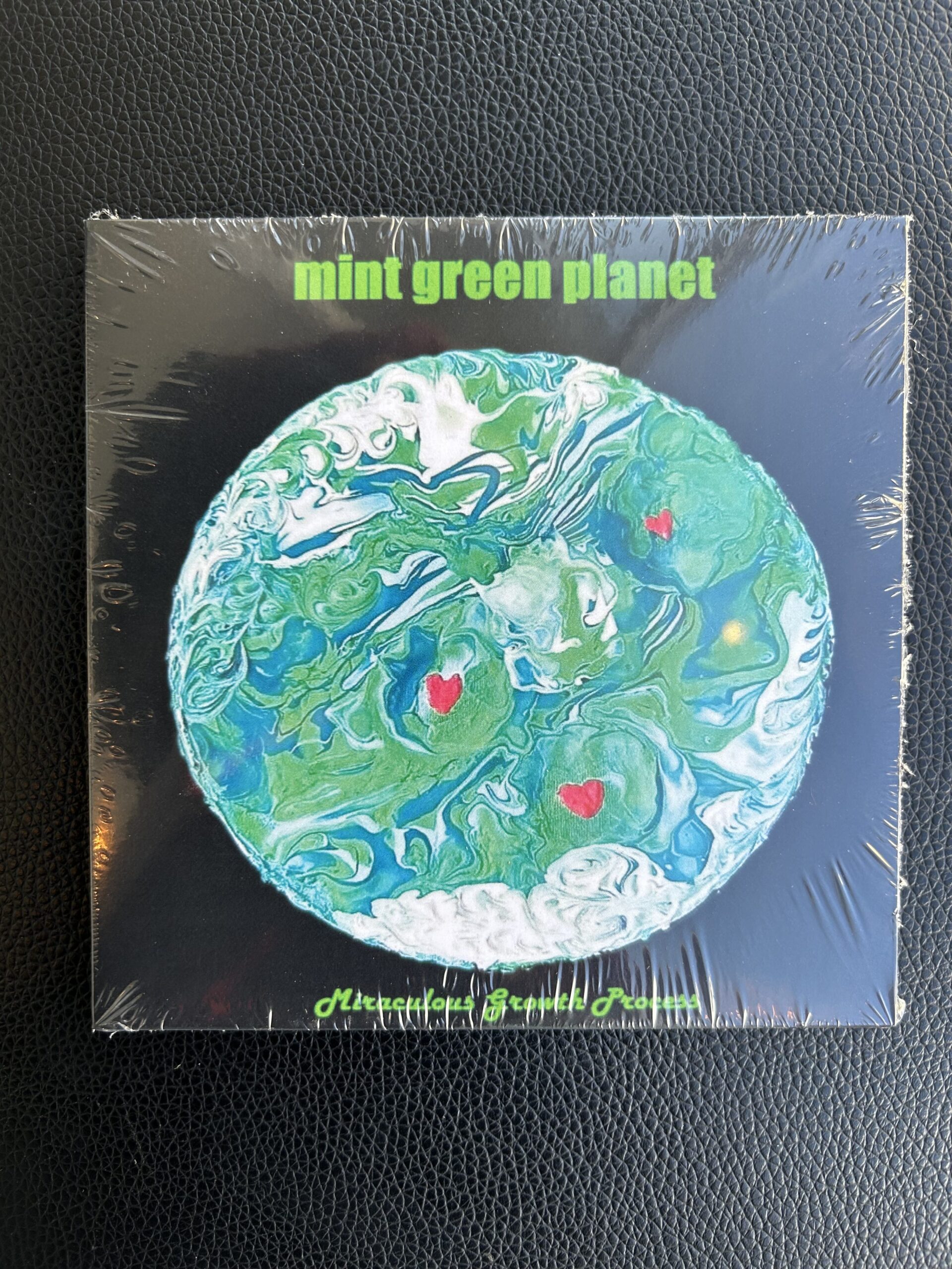 Mint Green Planet - Miraculous Growth Process
